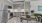 a kitchen with a table and chairs