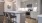 a kitchen with white cabinets